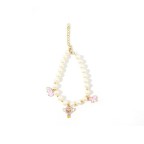 Flower-shaped pendant ribbon embellishes pet collar