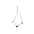 Flower-shaped pendant ribbon embellishes pet collar