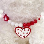 Heart-shaped ribbon-embellished pet collar