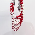 Heart-shaped ribbon-embellished pet collar
