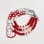 Heart-shaped ribbon-embellished pet collar